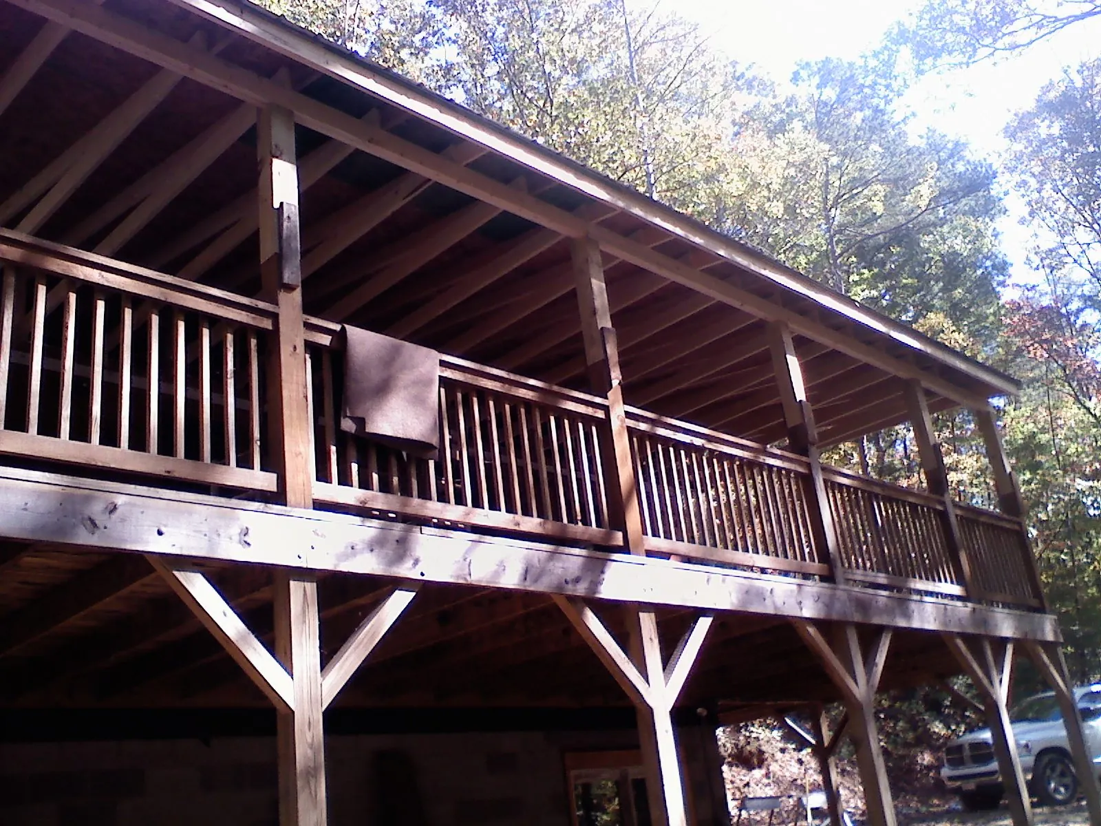 Timber framing under a new elevated porch and deck — Roof Leak Repair in Hubertus by Roofing Brothers